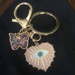 Butterfly eye purse charm key ring
